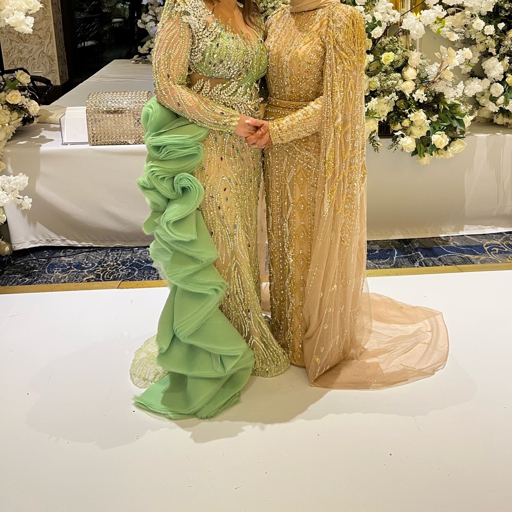 Green heavy beaded side ruffle dress for weddings